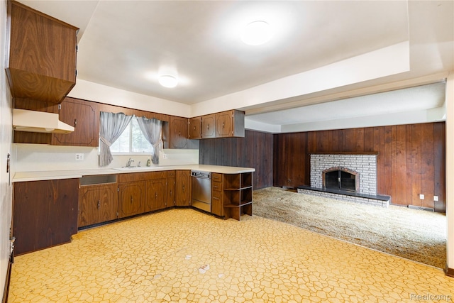 21819 Meridian Rd, Grosse Ile, MI 48138 - kitchen with open shelves, light countertops, dishwasher, under cabinet range hood, and open floor plan
