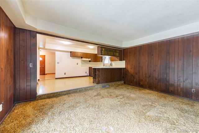 21819 Meridian Rd, Grosse Ile, MI 48138 - unfurnished living room featuring wood walls