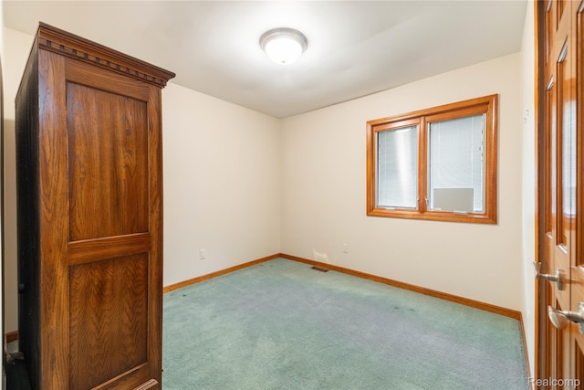 21819 Meridian Rd, Grosse Ile, MI 48138 - unfurnished bedroom with carpet and baseboards