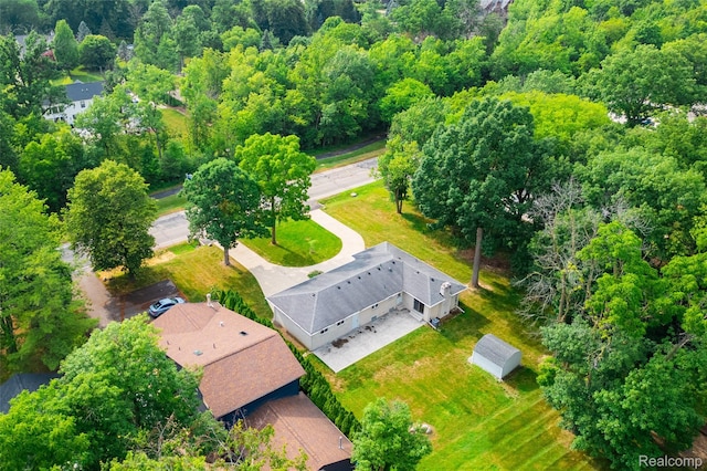 21819 Meridian Rd, Grosse Ile, MI 48138 - drone / aerial view of a heavily wooded area