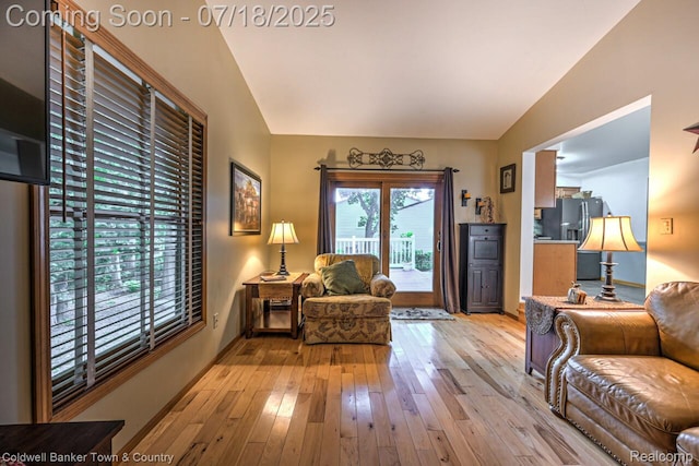 978 Oak Ridge Cir, Brighton, MI 48116 - living room featuring hardwood / wood-style floors and baseboards