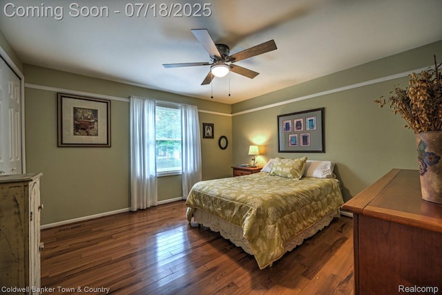 978 Oak Ridge Cir, Brighton, MI 48116 - bedroom featuring dark wood-style flooring and ceiling fan