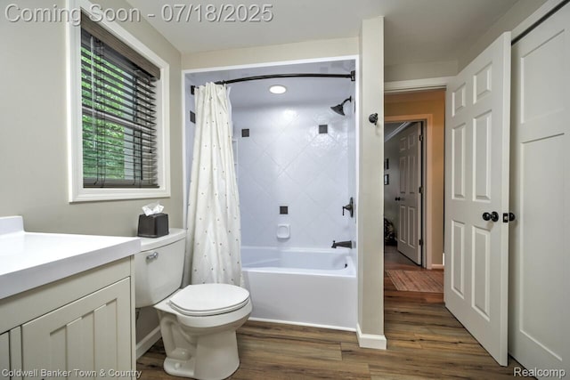 978 Oak Ridge Cir, Brighton, MI 48116 - full bathroom featuring wood finished floors, shower / bathtub combination with curtain, and vanity