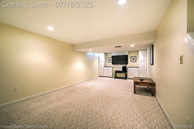 978 Oak Ridge Cir, Brighton, MI 48116 - unfurnished living room featuring carpet floors and recessed lighting