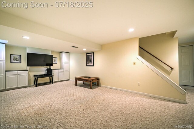 978 Oak Ridge Cir, Brighton, MI 48116 - unfurnished living room with carpet floors and recessed lighting