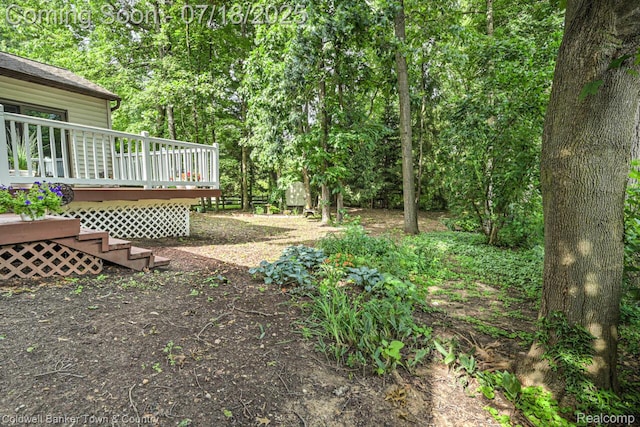 978 Oak Ridge Cir, Brighton, MI 48116 - view of yard featuring a deck