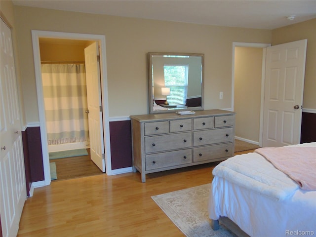 1429 Millbrook Trl, Ann Arbor, MI 48108 - bedroom featuring light wood-type flooring and connected bathroom