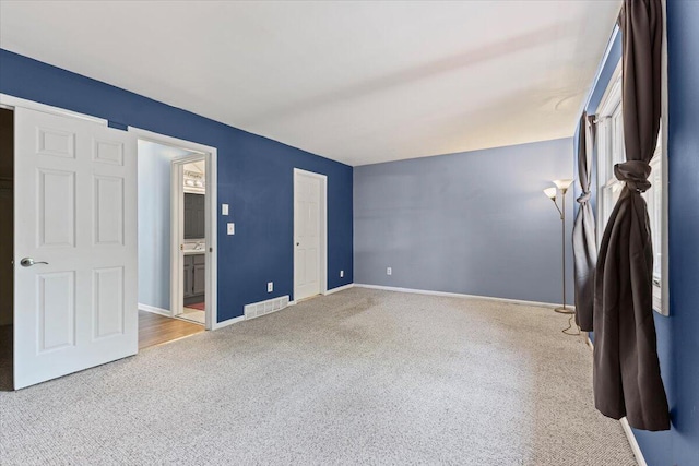 22830 Lincoln Ct, Saint Clair Shores, MI 48082 - unfurnished bedroom featuring carpet and ensuite bathroom