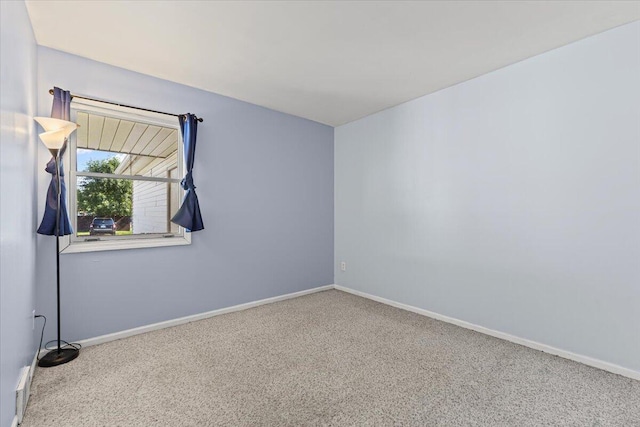 22830 Lincoln Ct, Saint Clair Shores, MI 48082 - spare room featuring carpet flooring and baseboards