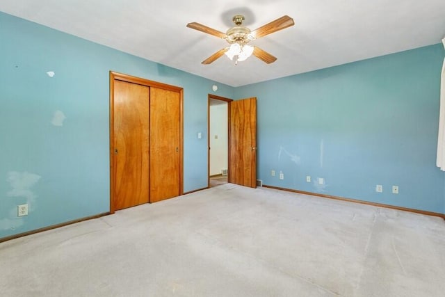 13613 Log Cabin Rd, Three Oaks, MI 49128 - unfurnished bedroom featuring a closet, carpet, and a ceiling fan