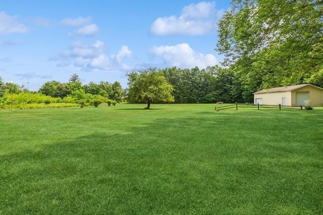 13613 Log Cabin Rd, Three Oaks, MI 49128 - view of yard with a detached garage and an outbuilding