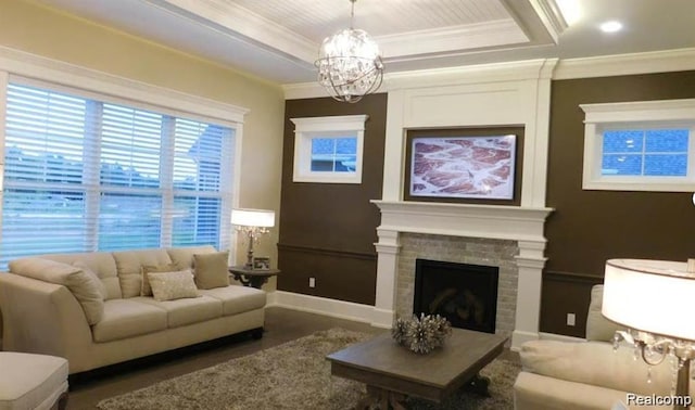 7345 Verona Dr, West Bloomfield, MI 48322 - living area with a chandelier, crown molding, a fireplace, and a tray ceiling