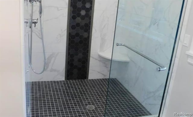7345 Verona Dr, West Bloomfield, MI 48322 - bathroom featuring a marble finish shower