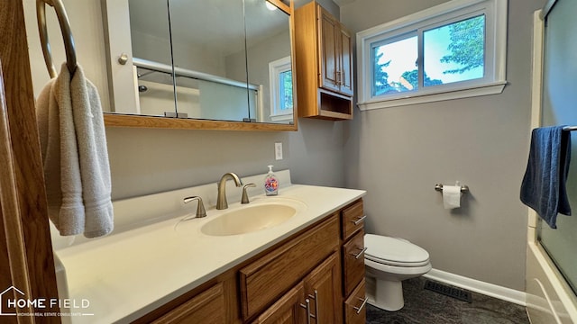 510 Martin St, Owosso, MI 48867 - bathroom featuring vanity and toilet
