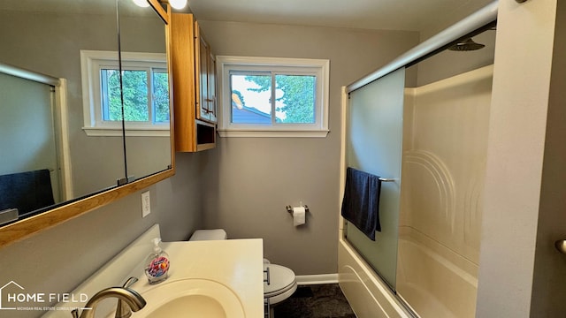 510 Martin St, Owosso, MI 48867 - bathroom featuring enclosed tub / shower combo and vanity