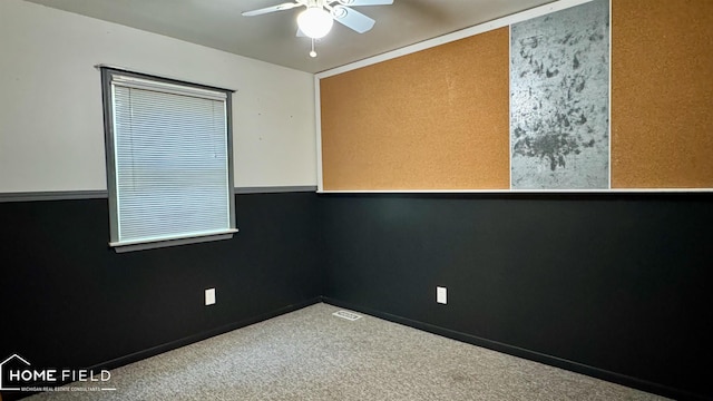 510 Martin St, Owosso, MI 48867 - spare room featuring a ceiling fan and carpet floors
