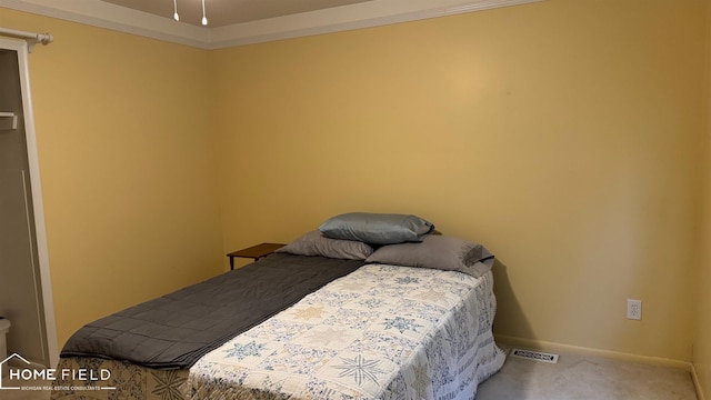 510 Martin St, Owosso, MI 48867 - carpeted bedroom featuring baseboards