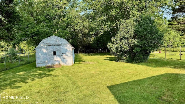 510 Martin St, Owosso, MI 48867 - view of yard featuring a storage unit