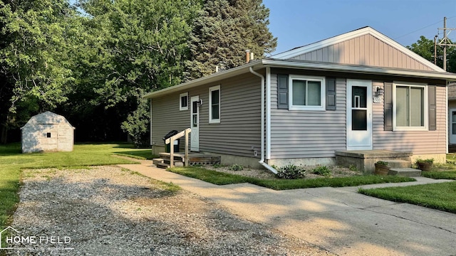 510 Martin St, Owosso, MI 48867 - bungalow with a shed and a front yard