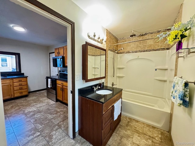 1128 White St, Port Huron, MI 48060 - full bath featuring shower / bathtub combination and two vanities