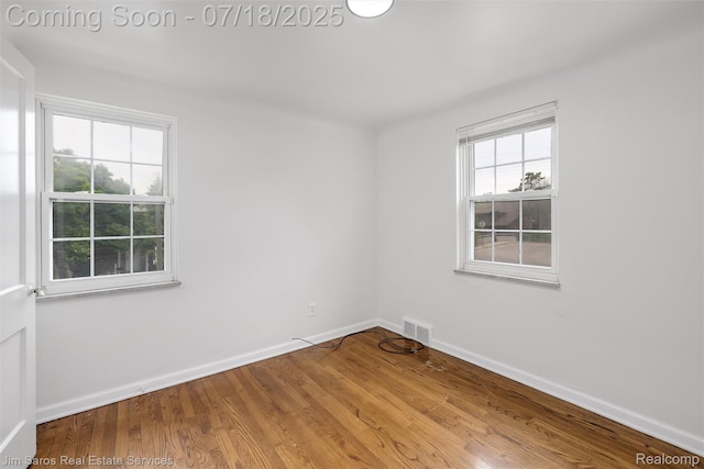 302 Alter Rd, Detroit, MI 48215 - spare room with baseboards and wood finished floors