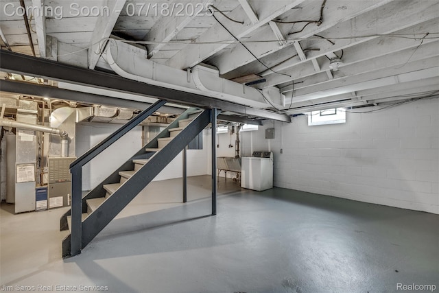 302 Alter Rd, Detroit, MI 48215 - below grade area with washer / dryer, stairs, and heating unit