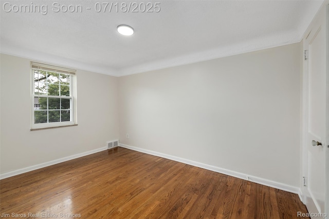 302 Alter Rd, Detroit, MI 48215 - spare room with wood finished floors and baseboards