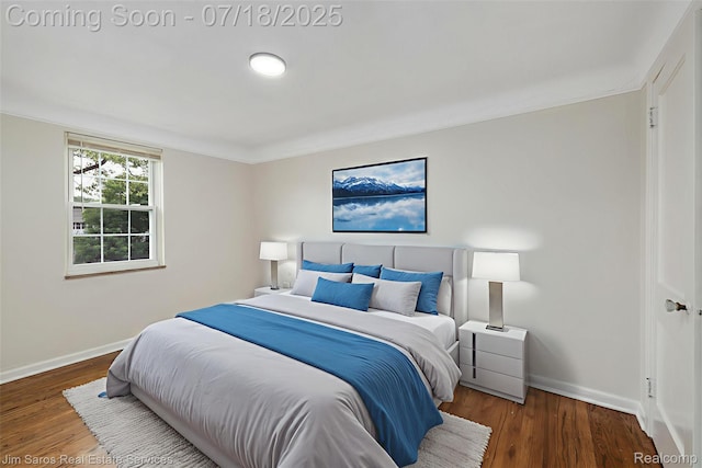 302 Alter Rd, Detroit, MI 48215 - bedroom with baseboards and wood finished floors
