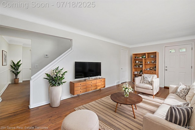 302 Alter Rd, Detroit, MI 48215 - living room featuring wood finished floors and stairs
