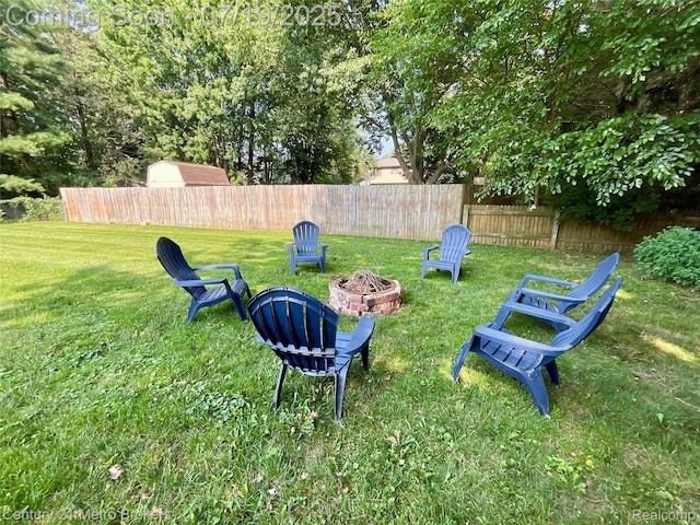 5363 Irish Rd, Grand Blanc, MI 48439 - view of yard featuring a fire pit