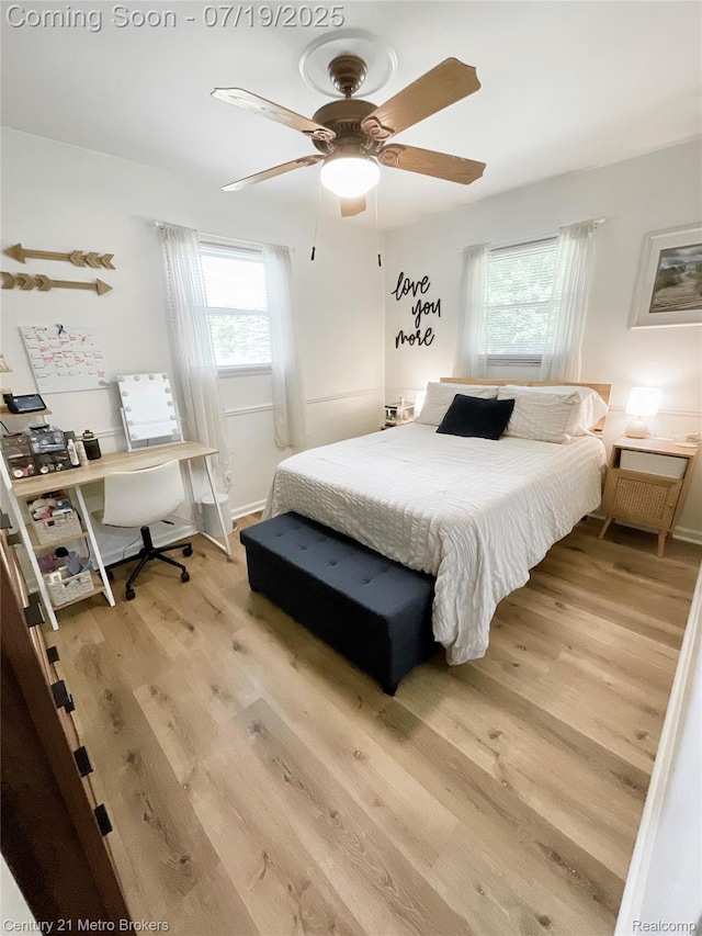 5363 Irish Rd, Grand Blanc, MI 48439 - bedroom featuring light wood-type flooring, a desk, and ceiling fan