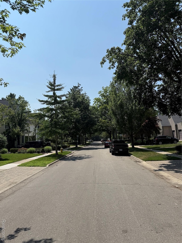 730 Wallace St, Birmingham, MI 48009 - view of asphalt road featuring sidewalks and curbs