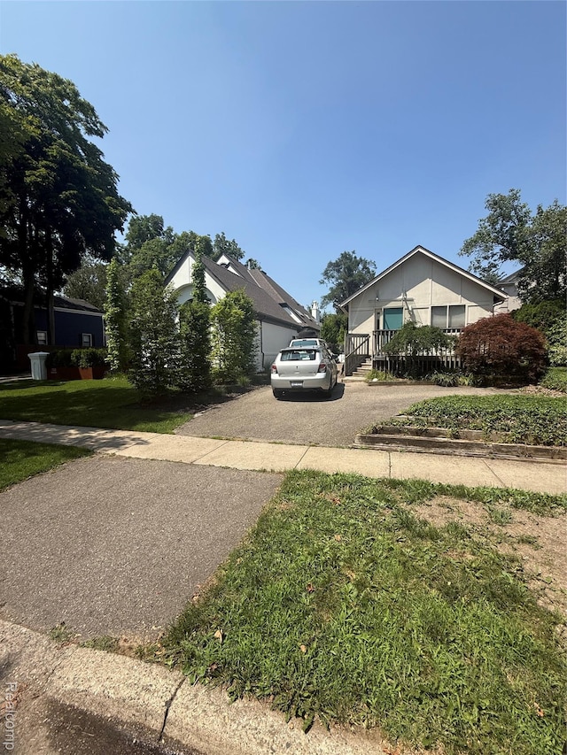 730 Wallace St, Birmingham, MI 48009 - view of front of house featuring driveway and a front lawn