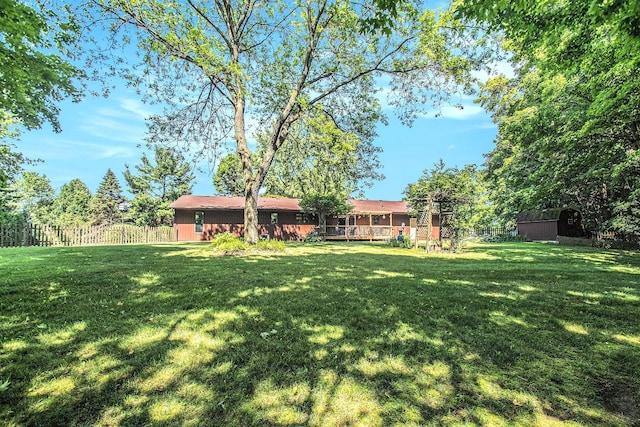 18354 Mount Zion Rd, Galien, MI 49113 - view of yard featuring a storage unit and a wooden deck