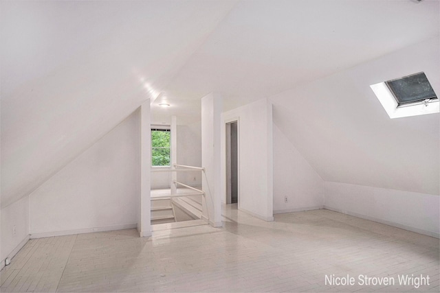 2146 Lansing St SE, Grand Rapids, MI 49506 - bonus room with a skylight and vaulted ceiling