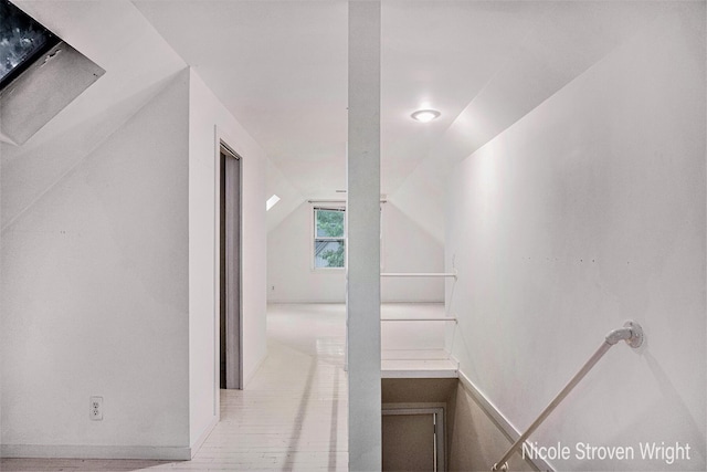 2146 Lansing St SE, Grand Rapids, MI 49506 - stairs featuring lofted ceiling