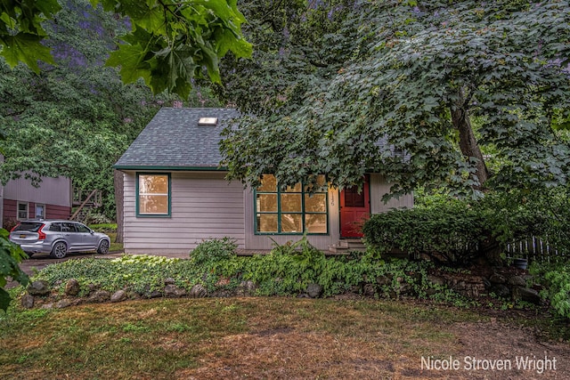 2146 Lansing St SE, Grand Rapids, MI 49506 - view of front of property featuring roof with shingles