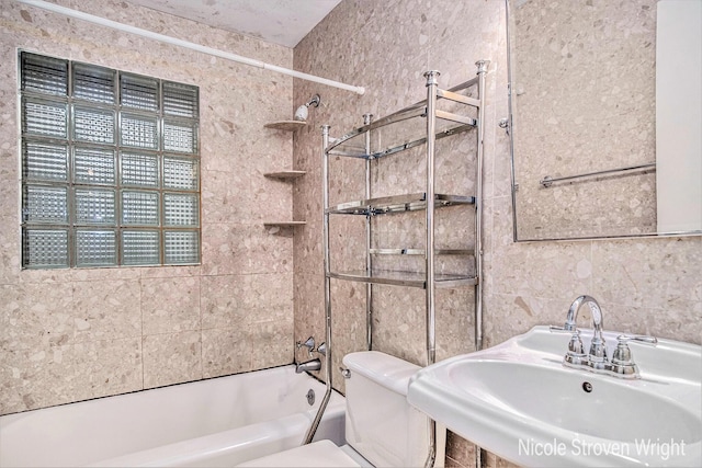 2146 Lansing St SE, Grand Rapids, MI 49506 - bathroom with tub / shower combination and tile walls