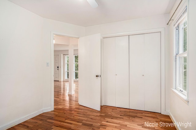 2146 Lansing St SE, Grand Rapids, MI 49506 - unfurnished bedroom featuring wood finished floors and a closet