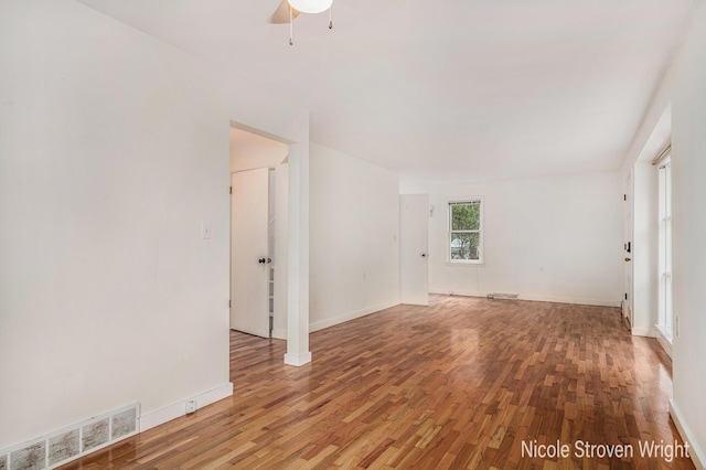 2146 Lansing St SE, Grand Rapids, MI 49506 - spare room with light wood-style floors and ceiling fan