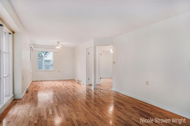 2146 Lansing St SE, Grand Rapids, MI 49506 - empty room with light wood-style floors and ceiling fan