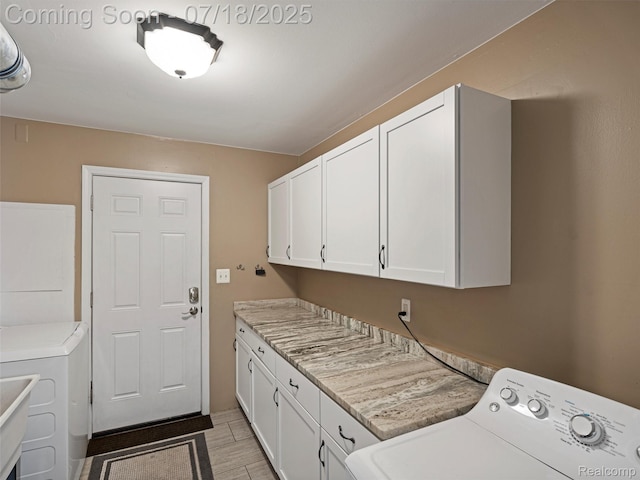 27034 Baldwin Ave, Warren, MI 48092 - washroom with cabinet space and washer and dryer