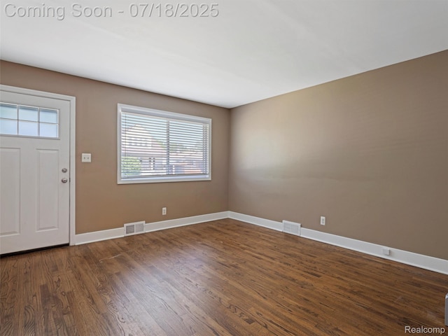 27034 Baldwin Ave, Warren, MI 48092 - foyer with healthy amount of natural light and dark wood-type flooring