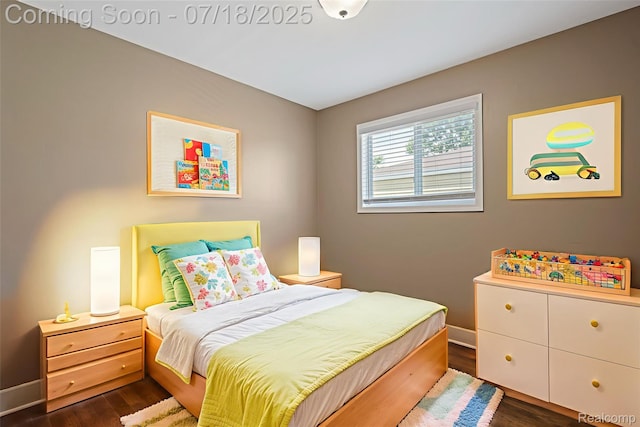 27034 Baldwin Ave, Warren, MI 48092 - bedroom with dark wood-style floors and baseboards