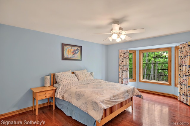 40600 8 Mile Rd, Northville, MI 48167 - bedroom with wood finished floors and a ceiling fan