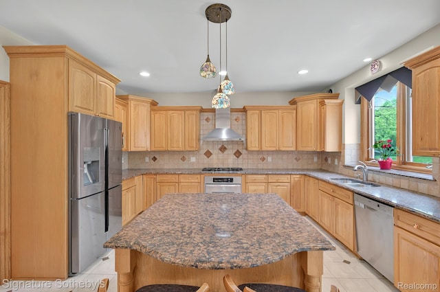40600 8 Mile Rd, Northville, MI 48167 - kitchen featuring appliances with stainless steel finishes, light brown cabinetry, a kitchen bar, decorative backsplash, and a center island