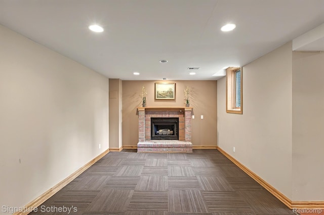 40600 8 Mile Rd, Northville, MI 48167 - unfurnished living room featuring dark carpet, a fireplace, and recessed lighting