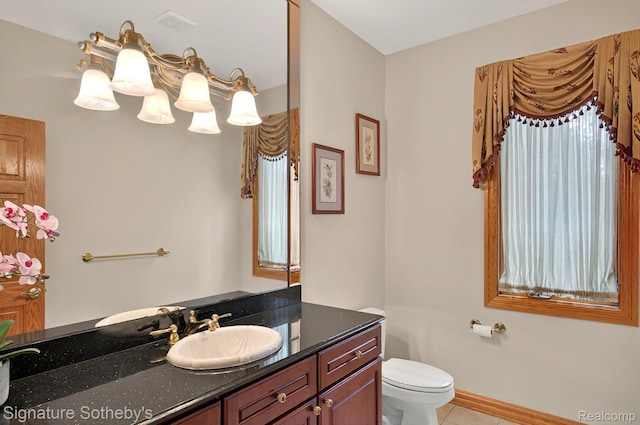 40600 8 Mile Rd, Northville, MI 48167 - bathroom with tile patterned floors, vanity, and a chandelier