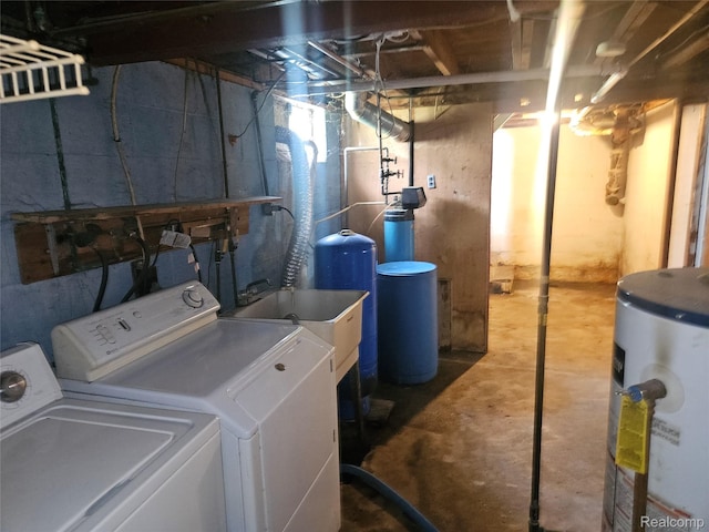 1081 W Parkwood Ave, Flint, MI 48507 - laundry room featuring electric water heater and washer and dryer