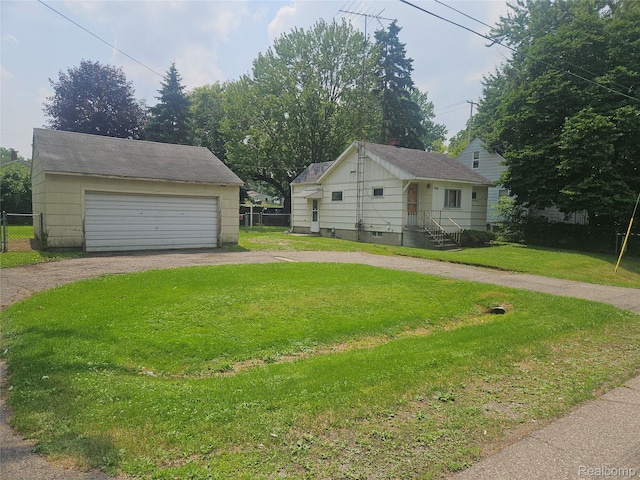 1081 W Parkwood Ave, Flint, MI 48507 - view of yard with a garage and an outdoor structure